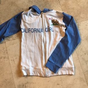 A cute zipper up jacket BARLY WORN